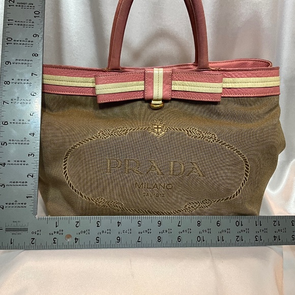 Prada, beige canvas Monogram tote with pink leather bow and trim.  173-H4g - Picture 2 of 15